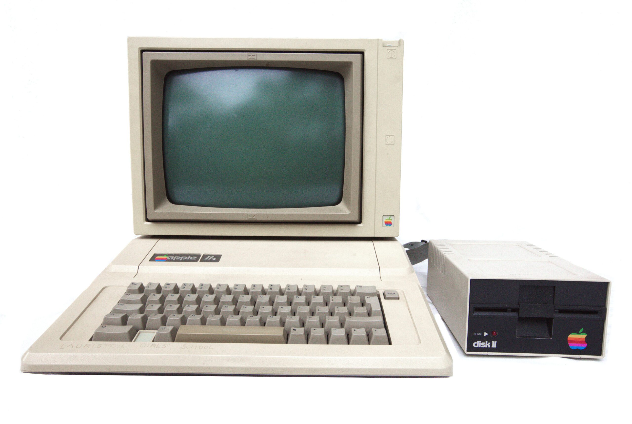 Front view of an Apple IIe system, including computer chassis, monitor, and external 5¼" floppy disk drive.